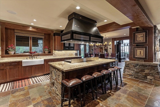 57 E 445 S, Garden City, UT 84028 - kitchen with recessed lighting, stone tile flooring, custom range hood, and a sink