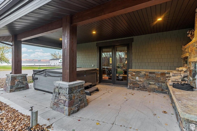 57 E 445 S, Garden City, UT 84028 - view of patio / terrace with french doors and a hot tub