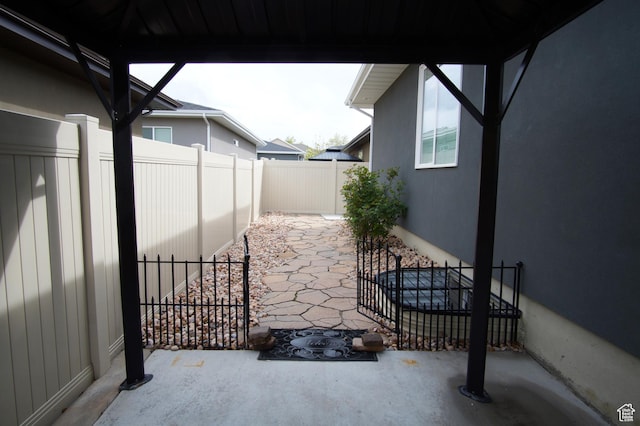 view of patio / terrace with a fenced backyard and a gazebo