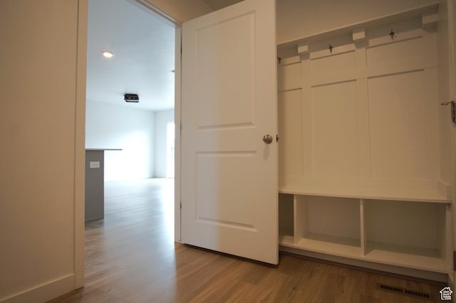 mudroom featuring wood finished floors and visible vents