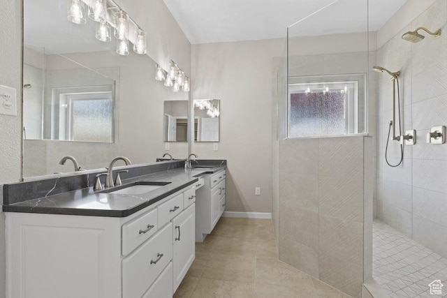 890 N Sky Mountain Ct, Hurricane, UT 84737 - full bath featuring a walk in shower, vanity, healthy amount of natural light, and tile patterned floors