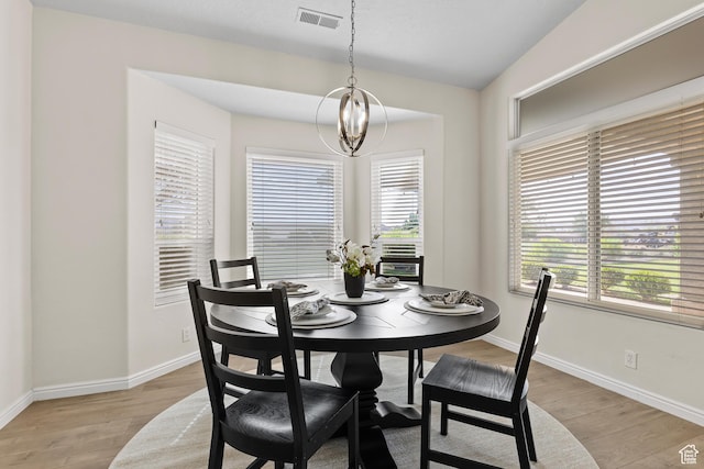890 N Sky Mountain Ct, Hurricane, UT 84737 - dining space featuring light wood-type flooring, baseboards, and a chandelier