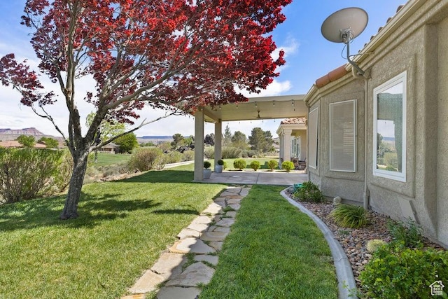 890 N Sky Mountain Ct, Hurricane, UT 84737 - view of green lawn featuring a patio area