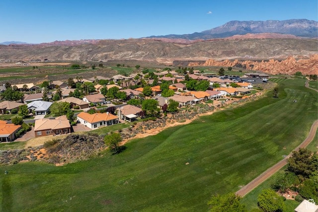 890 N Sky Mountain Ct, Hurricane, UT 84737 - aerial perspective of suburban area featuring a mountainous background and a local golf course