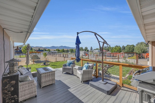 9185 S 200 W, Paradise, UT 84328 - wooden deck featuring a yard, a mountain view, a fenced backyard, and an outdoor living space