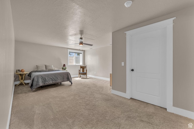 9185 S 200 W, Paradise, UT 84328 - carpeted bedroom featuring baseboards, a textured ceiling, and ceiling fan