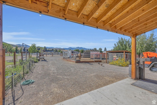 9185 S 200 W, Paradise, UT 84328 - view of patio / terrace featuring an outdoor structure and a mountain view