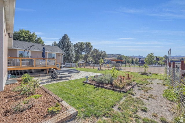 9185 S 200 W, Paradise, UT 84328 - view of yard featuring a patio area, fence, and a deck
