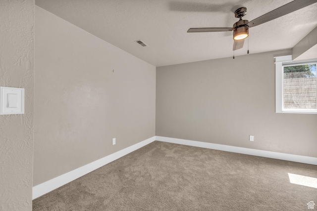 9185 S 200 W, Paradise, UT 84328 - spare room with a ceiling fan, a textured ceiling, baseboards, carpet flooring, and visible vents