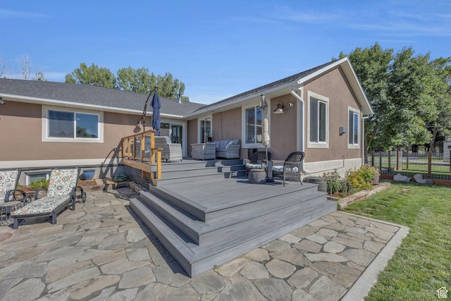 9185 S 200 W, Paradise, UT 84328 - back of property featuring stucco siding, outdoor lounge area, fence, and a deck