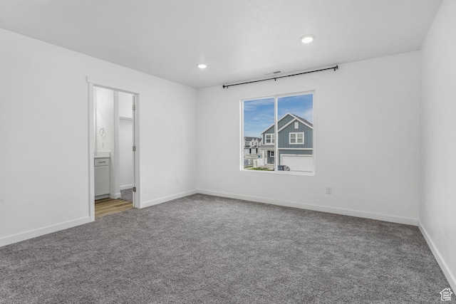 488 N Trident Dr, Saratoga Springs, UT 84045 - unfurnished bedroom featuring recessed lighting, carpet, baseboards, and connected bathroom