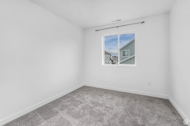 488 N Trident Dr, Saratoga Springs, UT 84045 - carpeted spare room featuring baseboards and visible vents