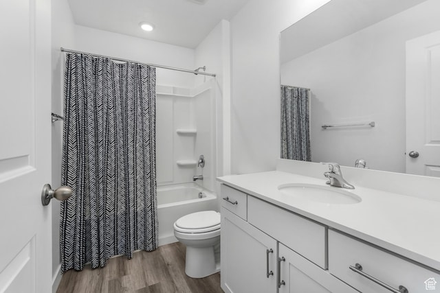 488 N Trident Dr, Saratoga Springs, UT 84045 - bathroom with wood finished floors, toilet, vanity, and shower / bathtub combination with curtain