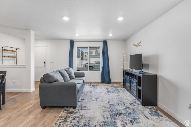 488 N Trident Dr, Saratoga Springs, UT 84045 - living room featuring baseboards, wood finished floors, and recessed lighting