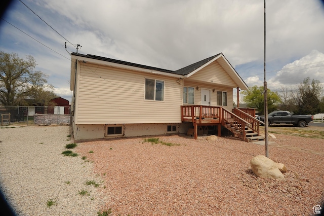 view of front of house featuring fence