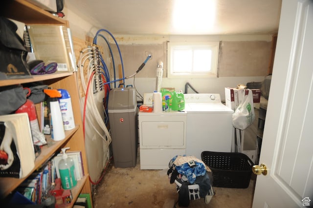 washroom with laundry area and separate washer and dryer