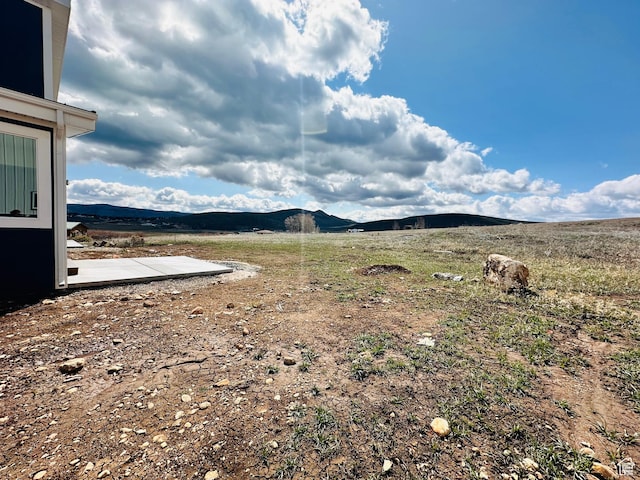 2747 S Country Club Way, Garden City, UT 84028 - view of yard featuring a mountain view