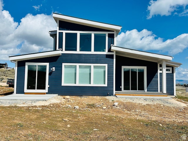 2747 S Country Club Way, Garden City, UT 84028 - rear view of house featuring a patio area