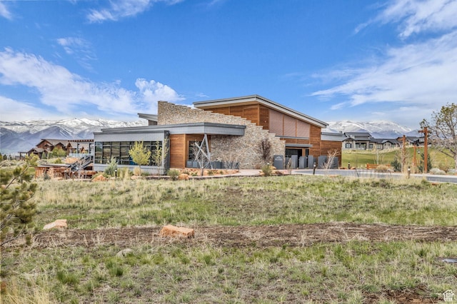 1622 E Abajo Peak Cir Unit Tv-23, Heber City, UT 84032 - rear view of house featuring a mountain view
