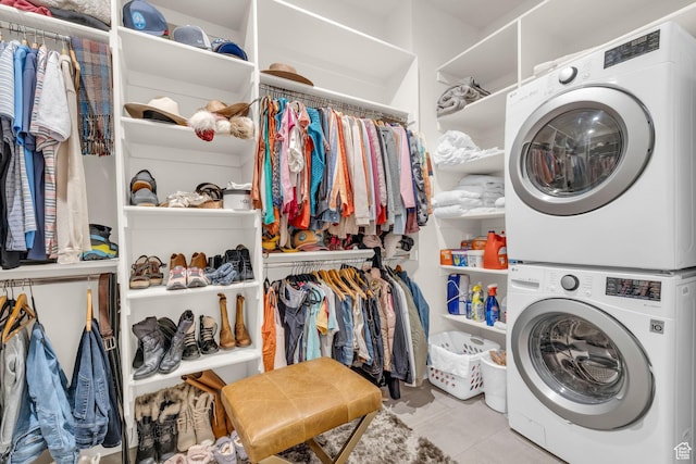 1622 E Abajo Peak Cir Unit Tv-23, Heber City, UT 84032 - laundry room featuring tile patterned flooring, stacked washer / drying machine, and laundry area