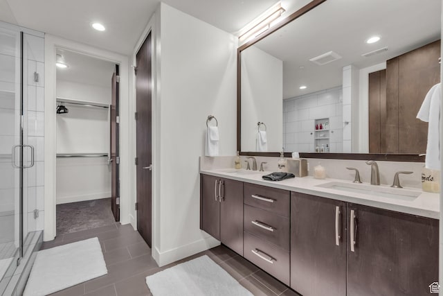 1622 E Abajo Peak Cir Unit Tv-23, Heber City, UT 84032 - full bathroom featuring visible vents, tile patterned flooring, a stall shower, and a sink