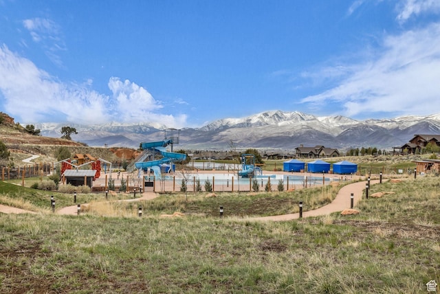 1622 E Abajo Peak Cir Unit Tv-23, Heber City, UT 84032 - view of yard with a mountain view, fence, and a playground