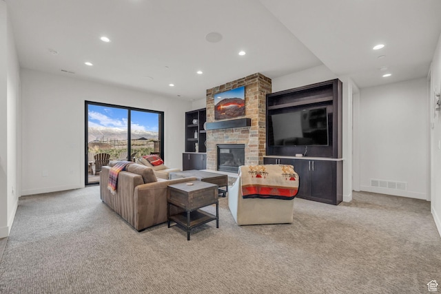 1622 E Abajo Peak Cir Unit Tv-23, Heber City, UT 84032 - living area featuring carpet flooring, baseboards, visible vents, recessed lighting, and a brick fireplace