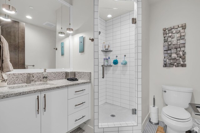 1622 E Abajo Peak Cir Unit Tv-23, Heber City, UT 84032 - bathroom featuring toilet, a stall shower, visible vents, tile patterned flooring, and vanity