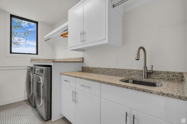 1622 E Abajo Peak Cir Unit Tv-23, Heber City, UT 84032 - laundry room featuring separate washer and dryer, cabinet space, a sink, and light tile patterned flooring