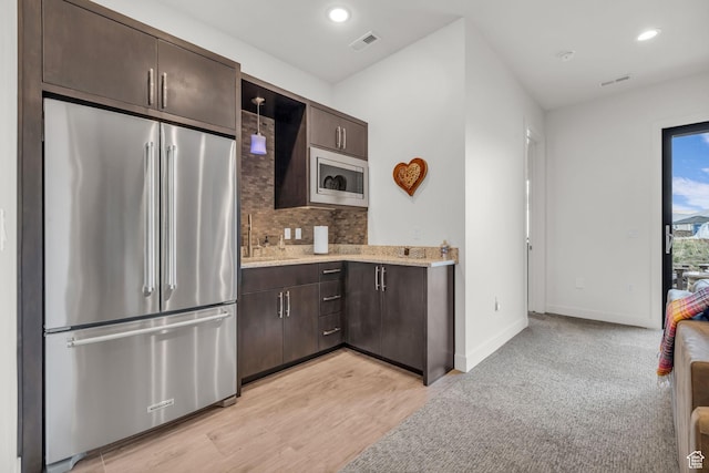 1622 E Abajo Peak Cir Unit Tv-23, Heber City, UT 84032 - kitchen featuring a sink, visible vents, dark brown cabinetry, and appliances with stainless steel finishes
