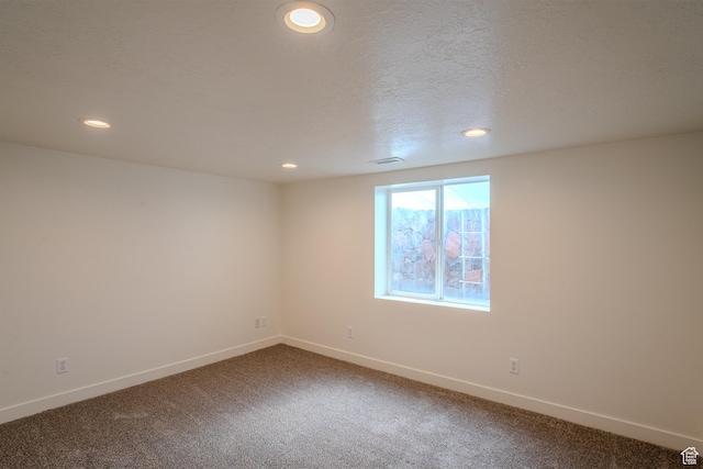 2976 E Saddle Rock Rd, Eagle Mountain, UT 84005 - spare room with dark carpet, baseboards, and recessed lighting