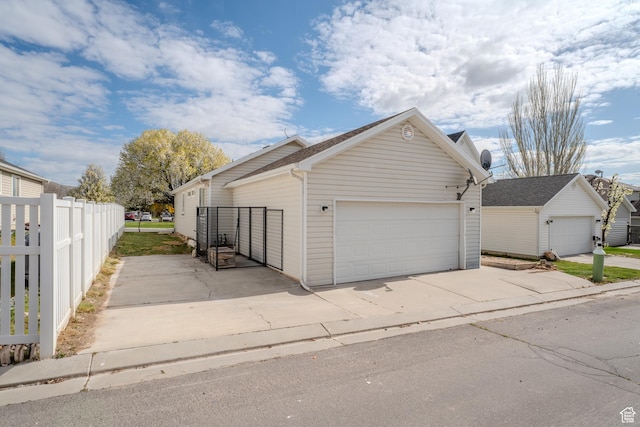 2976 E Saddle Rock Rd, Eagle Mountain, UT 84005 - exterior space featuring a garage and fence