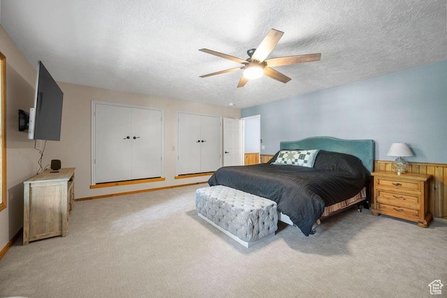 835 E Mountain View Dr, Pine Valley, UT 84781 - bedroom with a ceiling fan, a textured ceiling, and light colored carpet