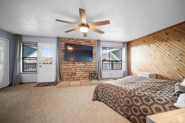835 E Mountain View Dr, Pine Valley, UT 84781 - carpeted bedroom featuring ceiling fan, a textured ceiling, and multiple windows