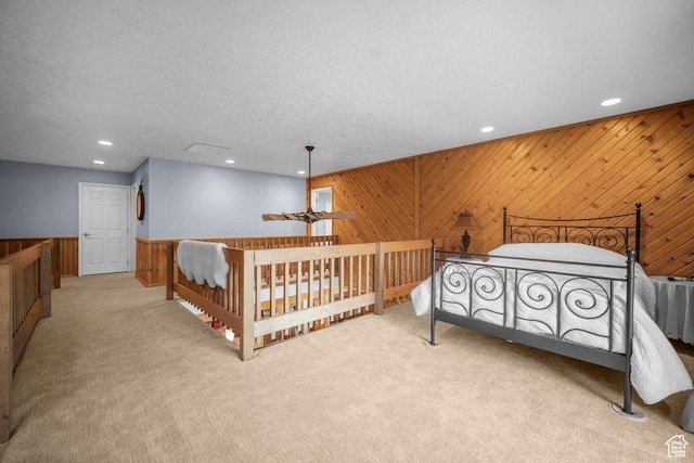 835 E Mountain View Dr, Pine Valley, UT 84781 - bedroom featuring wood walls, carpet flooring, and recessed lighting