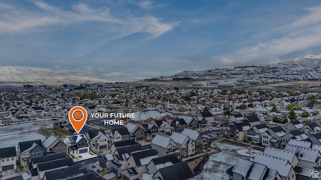 bird's eye view with a mountain view and a residential view