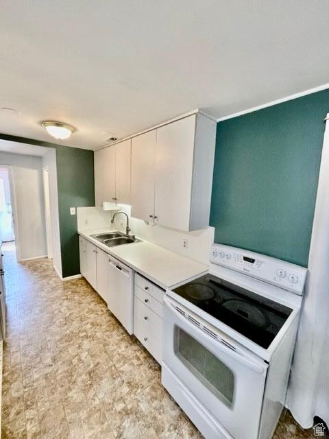 993 E 200 N, Provo, UT 84606 - kitchen featuring white cabinets, light countertops, white appliances, and a sink
