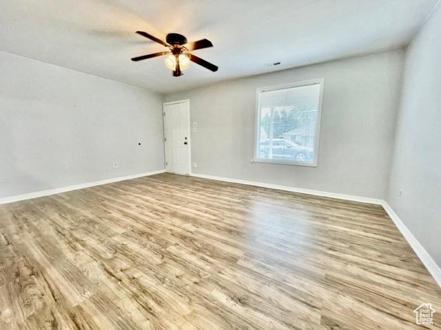 993 E 200 N, Provo, UT 84606 - empty room with baseboards, a ceiling fan, and wood finished floors