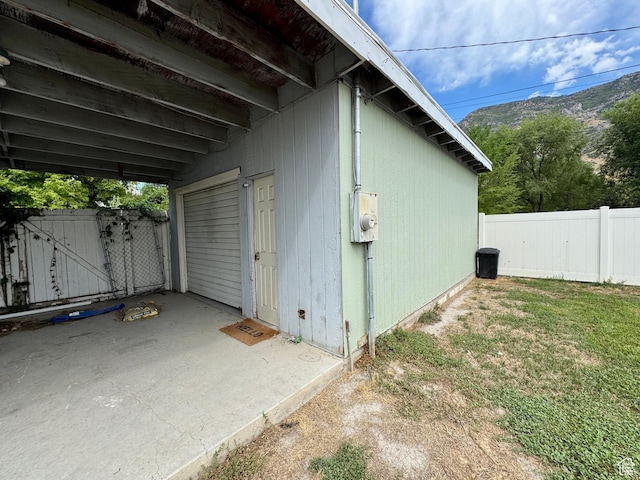 993 E 200 N, Provo, UT 84606 - view of side of property featuring fence, a patio area, and a mountain view
