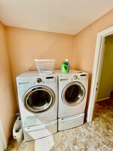 993 E 200 N, Provo, UT 84606 - clothes washing area with washer and dryer, stone finish floor, and laundry area