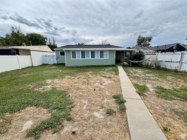 993 E 200 N, Provo, UT 84606 - exterior space with a fenced backyard, a front lawn, and a gate