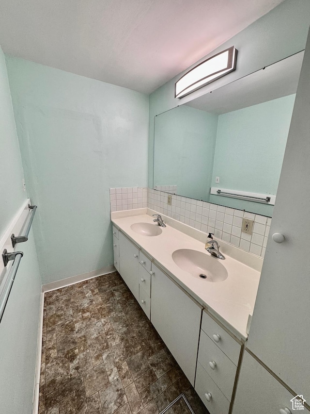 993 E 200 N, Provo, UT 84606 - full bathroom with baseboards, a sink, double vanity, and stone finish flooring