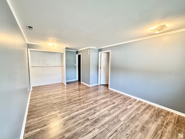 993 E 200 N, Provo, UT 84606 - unfurnished bedroom with baseboards, wood finished floors, visible vents, and crown molding