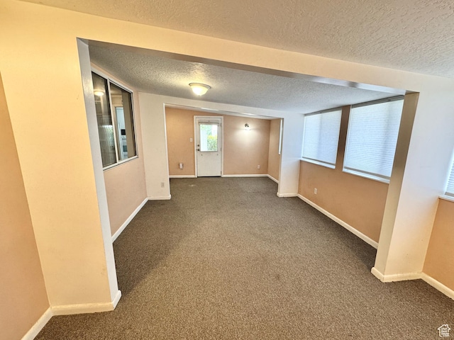 993 E 200 N, Provo, UT 84606 - carpeted spare room featuring baseboards and a textured ceiling