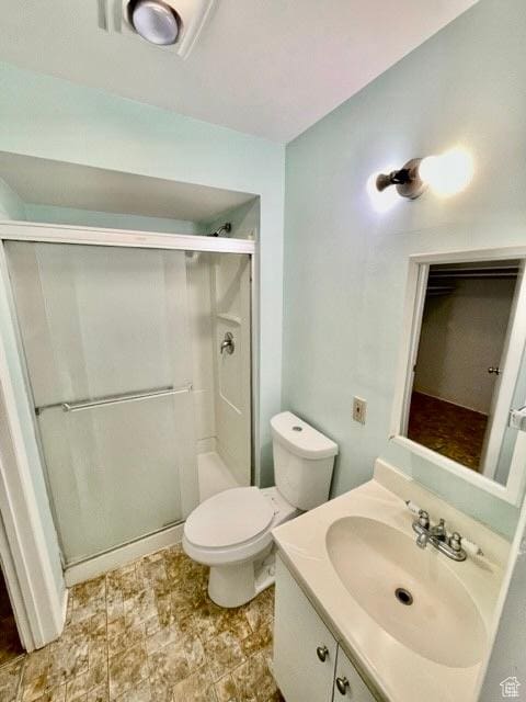 993 E 200 N, Provo, UT 84606 - bathroom with vanity, a shower stall, and toilet
