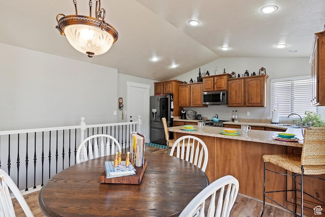 3295 S 1500 W, Perry, UT 84302 - dining room featuring recessed lighting, vaulted ceiling, and light wood-type flooring