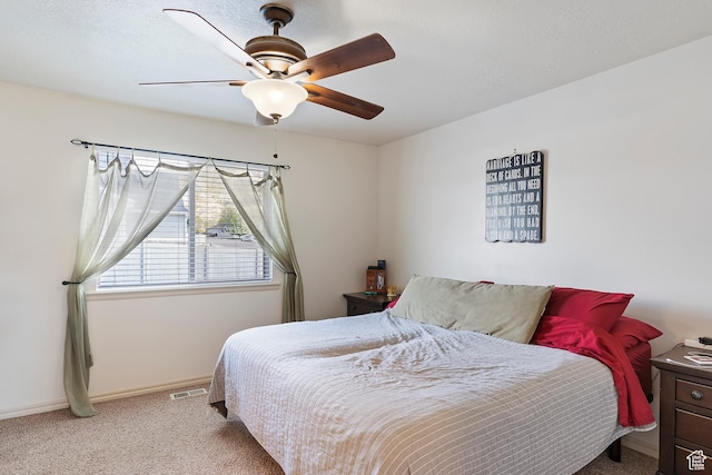 3295 S 1500 W, Perry, UT 84302 - carpeted bedroom with baseboards, a ceiling fan, and visible vents