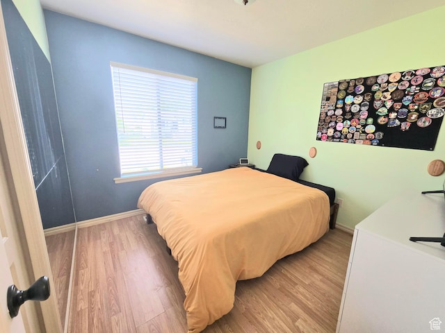 3295 S 1500 W, Perry, UT 84302 - bedroom with light wood-style flooring and baseboards