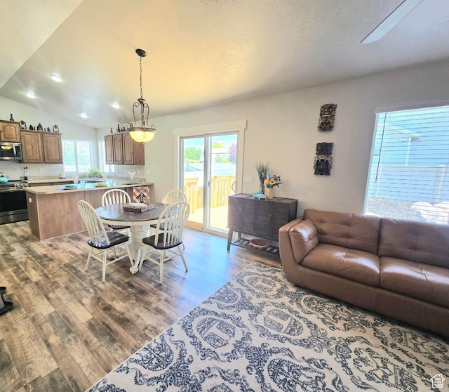 3295 S 1500 W, Perry, UT 84302 - dining room featuring wood finished floors, lofted ceiling, and recessed lighting