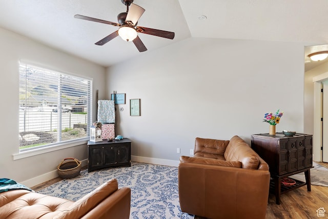 3295 S 1500 W, Perry, UT 84302 - living area with ceiling fan, lofted ceiling, wood finished floors, and baseboards
